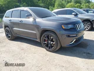 ✅ 2015 Jeep Grand Cherokee SRT • VIN: 1C4RJFDJ8FC920122 • Lot: 42567009. Wystawiony na IAAI z przebiegiem 124 591 mil. Bezpłatny archiwum sprzedaży aukcyjnych z USA i szczegółowy raport historii pojazdu na DreamBid. Zdjęcie 1.