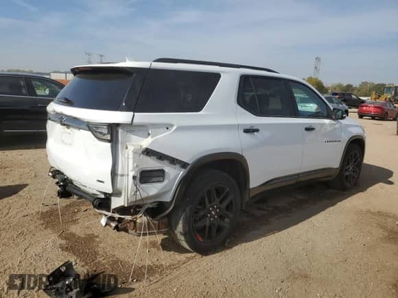 2021 Chevrolet Traverse Premier с VIN 1GNEVKKW0MJ179278, выставлен на аукционе Copart как лот 84952265 с пробегом 76 251 миль миль и Списание • Salvage title. История ставок и продаж доступна на DreamBid. Изображение 3.