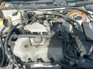 ✅ 2002 Ford Escort Fleet Standard • VIN: 3FAFP13P12R209941 • Lot: 41790208. Wystawiony na IAAI z przebiegiem 112 422 mil. Bezpłatny archiwum sprzedaży aukcyjnych z USA i szczegółowy raport historii pojazdu na DreamBid. Zdjęcie 19.