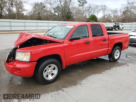 2008 Dodge Dakota SLT z VIN 1D7HE48NX8S505786, wystawiony jako Copart lot #86113494 z przebiegiem 128 937 mil mil oraz Szkoda całkowita • Salvage title. Historia ofert i sprzedaży dostępna na DreamBid. Obrazek 1.