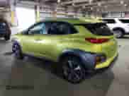 2019 Hyundai Kona Ultimate z VIN KM8K5CA54KU332715, wystawiony jako Copart lot #47771353 z przebiegiem 27 474 mil mil oraz . Historia ofert i sprzedaży dostępna na DreamBid. Obrazek 2.