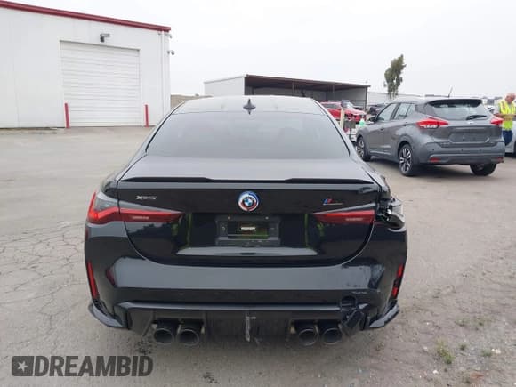 ✅ 2023 BMW M4 Competition xDrive • VIN: WBS43AZ07PCM99351 • Lot: 42643656. Listed on IAAI with 9,699 mi. Free auction sales archive from the USA and detailed vehicle history report at DreamBid. Image 16.