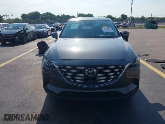 ✅ 2021 Mazda CX-9 Touring • VIN: JM3TCACYXM0511613 • Lot: 42294802. Listed on IAAI with 49,105 mi. Free auction sales archive from the USA and detailed vehicle history report at DreamBid. Image 12.