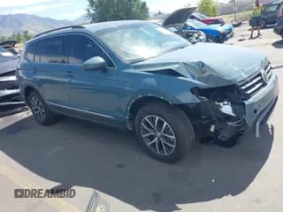 ✅ 2020 Volkswagen Tiguan SE • VIN: 3VV2B7AX4LM064018 • Lot: 43189376. Wystawiony na IAAI z przebiegiem 77 543 mil. Bezpłatny archiwum sprzedaży aukcyjnych z USA i szczegółowy raport historii pojazdu na DreamBid. Zdjęcie 1.