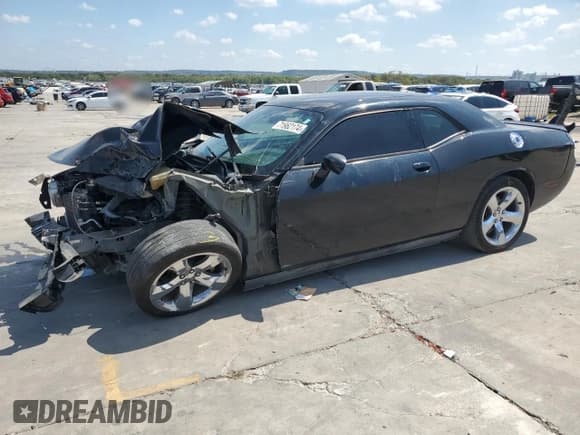 ✅ 2012 Dodge Challenger SXT Plus • VIN: 2C3CDYAG9CH174004 • Lot: 71962174. Wystawiony na Copart z przebiegiem 128 293 mil. Bezpłatny archiwum sprzedaży aukcyjnych z USA i szczegółowy raport historii pojazdu na DreamBid. Zdjęcie 1.