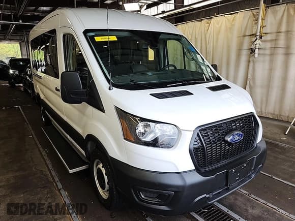 ✅ 2023 Ford Transit Passenger XL • VIN: 1FBAX2C82PKB52779 • Lot: 42459426. Listed on IAAI with 9,080 mi. Free auction sales archive from the USA and detailed vehicle history report at DreamBid. Image 1.