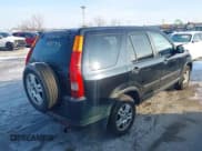 ✅ 2003 Honda CR-V EX • VIN: JHLRD78823C011425 • Lot: 43924597. Listed on IAAI with 238,579 mi. Free auction sales archive from the USA and detailed vehicle history report at DreamBid. Image 4.