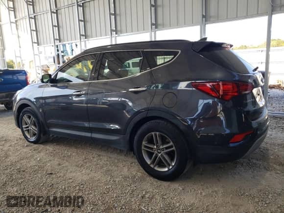 2018 Hyundai Santa Fe 2.4L z VIN 5XYZU3LB7JG543240, wystawiony jako Copart lot #89693095 z przebiegiem 121 636 mil mil oraz Czysty tytuł • Clean title. Historia ofert i sprzedaży dostępna na DreamBid. Obrazek 2.