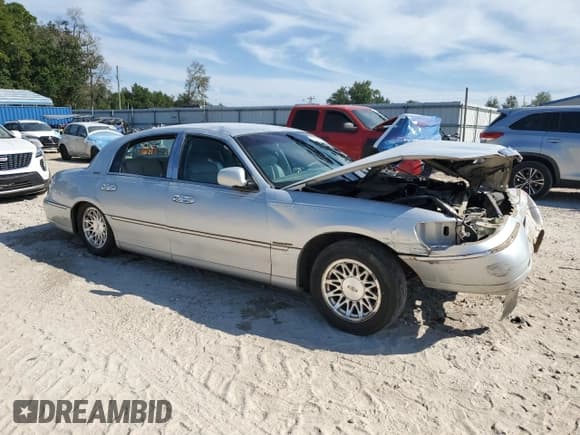 ✅ 1998 Lincoln Town Car Signature • VIN: 1LNFM82W0WY734500 • Lot: 70578805. Listed on Copart with Not provided. Free auction sales archive from the USA and detailed vehicle history report at DreamBid. Image 4.