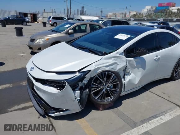 ✅ 2024 Toyota Prius LE • VIN: JTDACAAU8R3042124 • Lot: 42642952. Listed on IAAI with 2,003 mi. Free auction sales archive from the USA and detailed vehicle history report at DreamBid. Image 6.