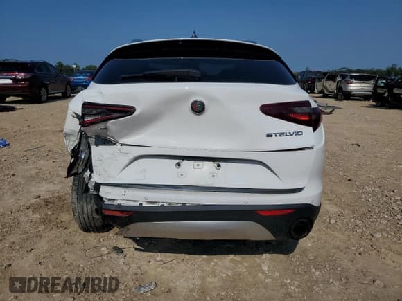 ✅ 2018 Alfa Romeo Stelvio Ti • VIN: ZASFAKBN3J7C26917 • Лот: 68810165. Опубликован ранее на Copart с пробегом 72 925 миль. Бесплатный доступ к архиву аукционных продаж из США и подробный отчёт об истории автомобиля на DreamBid. Изображение 6.