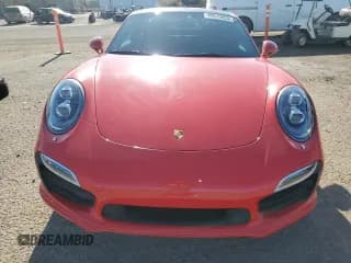 ✅ 2015 Porsche 911 Turbo S • VIN: WP0AD2A9XFS166153 • Lot: 49815853. Wystawiony na Copart z przebiegiem 20 184 mil. Bezpłatny archiwum sprzedaży aukcyjnych z USA i szczegółowy raport historii pojazdu na DreamBid. Zdjęcie 5.