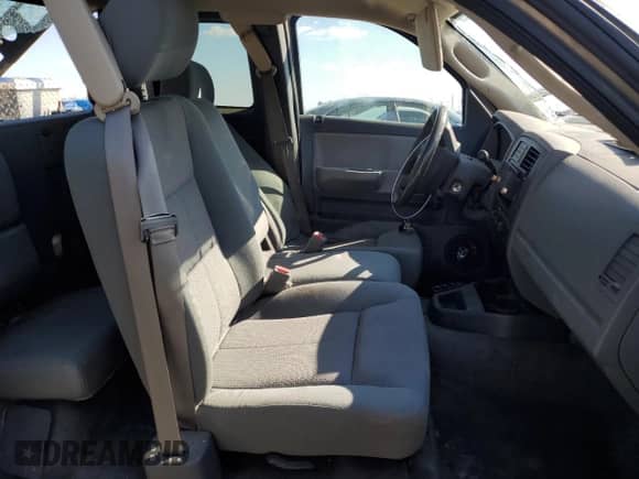 2005 Dodge Dakota ST с VIN 1D7HE22N75S353538, выставлен на аукционе Copart как лот 55830985 с пробегом 131 279 миль миль и На запчасти • Non repairable. История ставок и продаж доступна на DreamBid. Изображение 7.