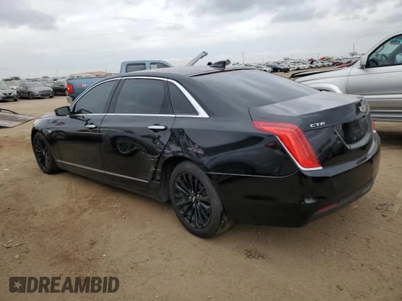 ✅ 2016 Cadillac CT6 RWD • VIN: 1G6KA5RX9GU166820 • Lot: 66953154. Listed on Copart with 106,054 mi. Free auction sales archive from the USA and detailed vehicle history report at DreamBid. Image 2.