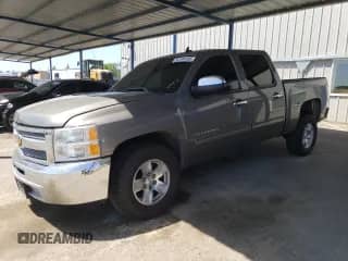 2013 Chevrolet Silverado 1500 LT with VIN 3GCPCSEA2DG145299, listed as a Copart auction lot 56194165 with 107,398 mi miles and Salvage title. Bid and sale history available at DreamBid. Image 1.