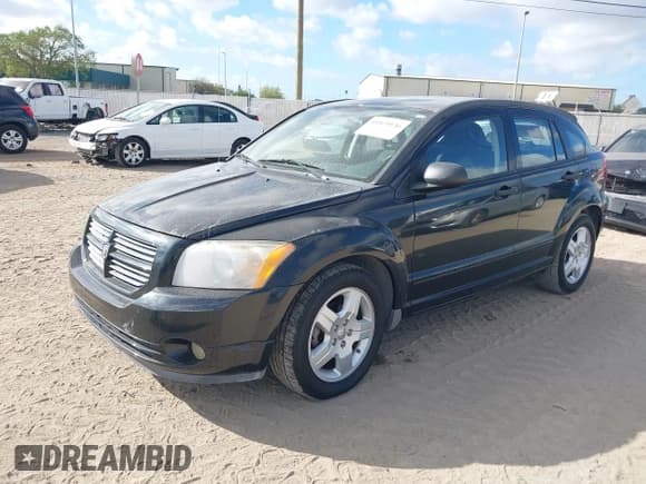 ✅ 2008 Dodge Caliber SXT • VIN: 1B3HB48B98D506460 • Lot: 41829536. Listed on IAAI with 61,826 mi. Free auction sales archive from the USA and detailed vehicle history report at DreamBid. Image 2.
