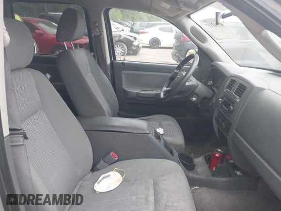 ✅ 2007 Dodge Dakota SLT • VIN: 1D7HE48P77S150303 • Лот: 42342137. Опубликован ранее на IAAI с пробегом 219 528 миль. Бесплатный доступ к архиву аукционных продаж из США и подробный отчёт об истории автомобиля на DreamBid. Изображение 5.