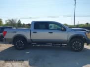 ✅ 2018 Nissan Titan Pro-4X • VIN: 1N6AA1E51JN551695 • Lot: 43365881. Listed on IAAI with 114,790 mi. Free auction sales archive from the USA and detailed vehicle history report at DreamBid. Image 14.