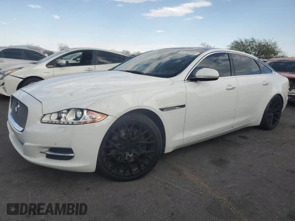 ✅ 2015 Jaguar XJ Portfolio • VIN: SAJWJ2GD9F8V80808 • Lot: 69785955. Wystawiony na Copart z przebiegiem 145 257 mil. Bezpłatny archiwum sprzedaży aukcyjnych z USA i szczegółowy raport historii pojazdu na DreamBid. Zdjęcie 1.