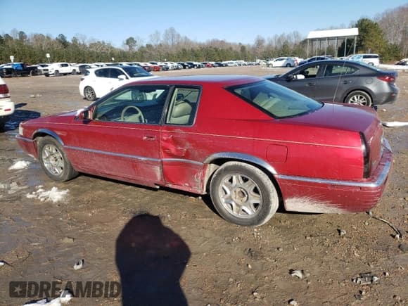 ✅ 1998 Cadillac Eldorado • VIN: 1G6EL12Y1WU602125 • Lot: 87598835. Listed on Copart with 205,941 mi. Free auction sales archive from the USA and detailed vehicle history report at DreamBid. Image 2.