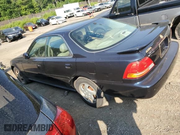 ✅ 1997 Acura TL Premium • VIN: JH4UA3650VC001754 • Lot: 66266715. Listed on Copart with 128,350 mi. Free auction sales archive from the USA and detailed vehicle history report at DreamBid. Image 2.