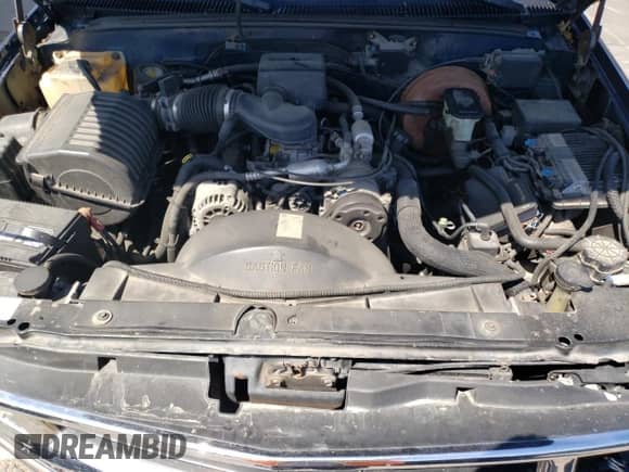 1998 Chevrolet Tahoe z VIN 3GNEK18R4WG101899, wystawiony jako Copart lot #71780145 z przebiegiem 264 478 mil mil oraz Szkoda całkowita • Salvage title. Historia ofert i sprzedaży dostępna na DreamBid. Obrazek 12.