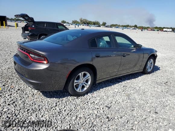 ✅ 2022 Dodge Charger SXT • VIN: 2C3CDXBG5NH261636 • Lot: 92907425. Wystawiony na Copart z przebiegiem 57 290 mil. Bezpłatny archiwum sprzedaży aukcyjnych z USA i szczegółowy raport historii pojazdu na DreamBid. Zdjęcie 3.