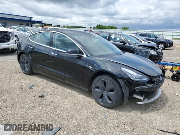 ✅ 2019 Tesla Model 3 Mid Range • VIN: 5YJ3E1EA1KF409991 • Лот: 59198445. Опубликован ранее на Copart с пробегом 69 535 миль. Бесплатный доступ к архиву аукционных продаж из США и подробный отчёт об истории автомобиля на DreamBid. Изображение 4.