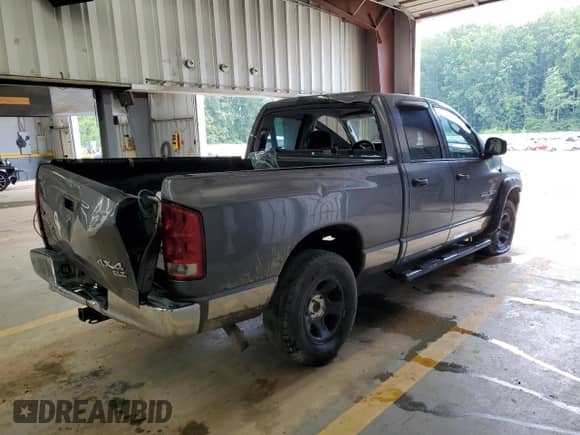 2003 Dodge 1500 ST z VIN 1D7HU18D53J643744, wystawiony jako Copart lot #62957654 z przebiegiem 240 625 mil mil oraz Szkoda całkowita • Salvage title. Historia ofert i sprzedaży dostępna na DreamBid. Obrazek 3.