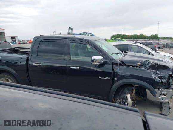 ✅ 2009 Dodge 1500 Laramie • VIN: 1D3HV13T99J517280 • Lot: 42256511. Wystawiony na IAAI z przebiegiem 232 073 mil. Bezpłatny archiwum sprzedaży aukcyjnych z USA i szczegółowy raport historii pojazdu na DreamBid. Zdjęcie 13.