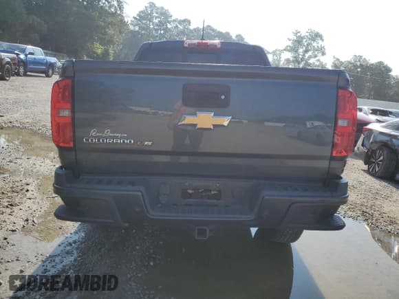 ✅ 2020 Chevrolet Colorado 2WD Z71 • VIN: 1GCGSDEN4L1135341 • Лот: 68313164. Опубликован ранее на Copart с пробегом 57 079 миль. Бесплатный доступ к архиву аукционных продаж из США и подробный отчёт об истории автомобиля на DreamBid. Изображение 6.