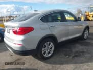✅ 2017 BMW X4 xDrive28i • VIN: 5UXXW3C3XH0T79913 • Lot: 43708564. Listed on IAAI with 100,865 mi. Free auction sales archive from the USA and detailed vehicle history report at DreamBid. Image 4.