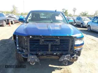 2017 Chevrolet Silverado 1500 LT z VIN 1GCVKREC4HZ396769, wystawiony jako IAAI lot #43465061 z przebiegiem 126 379 mil mil oraz . Historia ofert i sprzedaży dostępna na DreamBid. Obrazek 6.