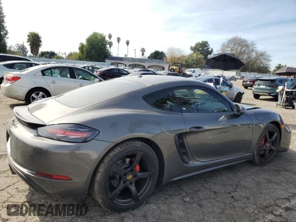 ✅ 2018 Porsche 718 Cayman S • VIN: WP0AB2A82JK278693 • Lot: 42870264. Listed on Copart with 43,164 mi. Free auction sales archive from the USA and detailed vehicle history report at DreamBid. Image 3.