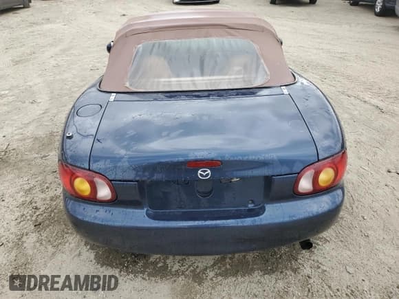 ✅ 1999 Mazda MX-5 Miata • VIN: JM1NB3534X0108667 • Lot: 84275075. Listed on Copart with 159,579 mi. Free auction sales archive from the USA and detailed vehicle history report at DreamBid. Image 6.