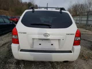 2006 Hyundai Tucson GL z VIN KM8JM12B86U441353, wystawiony jako Copart lot #42886664 z przebiegiem 110 495 mil mil oraz Szkoda całkowita • Salvage title. Historia ofert i sprzedaży dostępna na DreamBid. Obrazek 6.