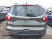 ✅ 2019 Ford Escape SE • VIN: 1FMCU0GD2KUB23252 • Lot: 43727305. Wystawiony na IAAI z przebiegiem 163 721 mil. Bezpłatny archiwum sprzedaży aukcyjnych z USA i szczegółowy raport historii pojazdu na DreamBid. Zdjęcie 16.