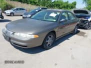 ✅ 1999 Oldsmobile Intrigue GX • VIN: 1G3WH52K5XF334949 • Lot: 42252647. Wystawiony na IAAI z przebiegiem 80 705 mil. Bezpłatny archiwum sprzedaży aukcyjnych z USA i szczegółowy raport historii pojazdu na DreamBid. Zdjęcie 2.