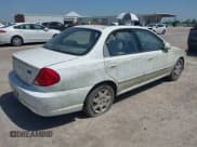 ✅ 2003 Kia Spectra • VIN: KNAFB121X35225904 • Lot: 42777789. Wystawiony na IAAI z przebiegiem 168 628 mil. Bezpłatny archiwum sprzedaży aukcyjnych z USA i szczegółowy raport historii pojazdu na DreamBid. Zdjęcie 4.