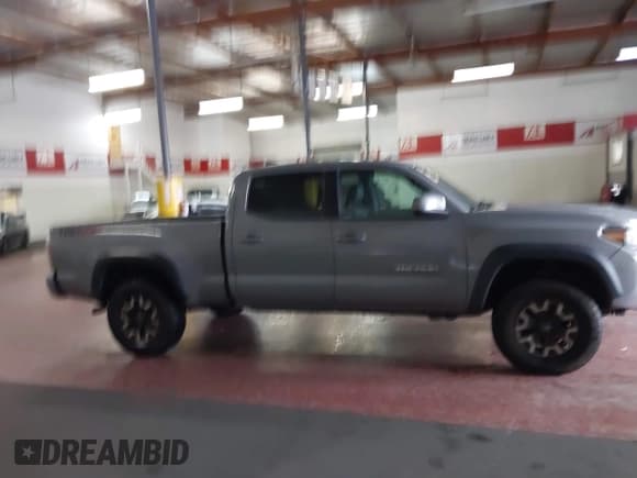 ✅ 2021 Toyota Tacoma SR5 • VIN: 3TMDZ5BN5MM114494 • Лот: 41723032. Опубликован ранее на IAAI с пробегом 54 477 миль. Бесплатный доступ к архиву аукционных продаж из США и подробный отчёт об истории автомобиля на DreamBid. Изображение 13.