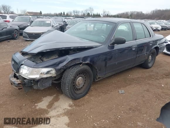 ✅ 2001 Ford Crown Victoria Police Interceptor • VIN: 2FAFP71W01X198332 • Лот: 41474334. Опубликован ранее на IAAI с пробегом 141 148 миль. Бесплатный доступ к архиву аукционных продаж из США и подробный отчёт об истории автомобиля на DreamBid. Изображение 2.