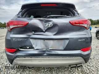 2018 Hyundai Tucson Sport z VIN KM8J33AL5JU736251, wystawiony jako Copart lot #86275695 z przebiegiem 81 205 mil mil oraz Szkoda całkowita • Salvage title. Historia ofert i sprzedaży dostępna na DreamBid. Obrazek 6.