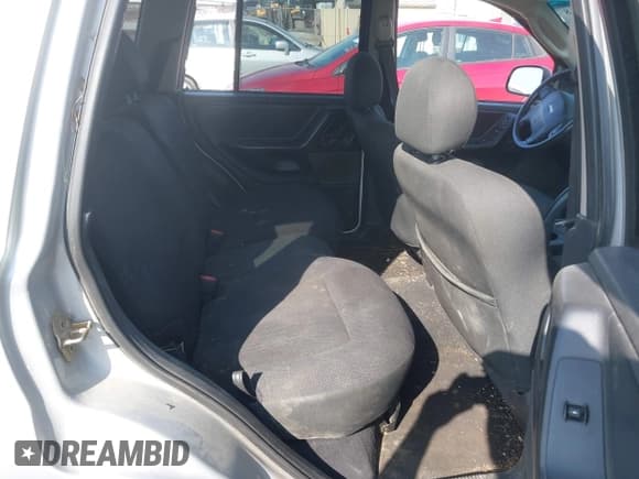 ✅ 2004 Jeep Grand Cherokee Laredo • VIN: 1J4GW48S34C272700 • Lot: 42494918. Listed on IAAI with 214,843 mi. Free auction sales archive from the USA and detailed vehicle history report at DreamBid. Image 8.