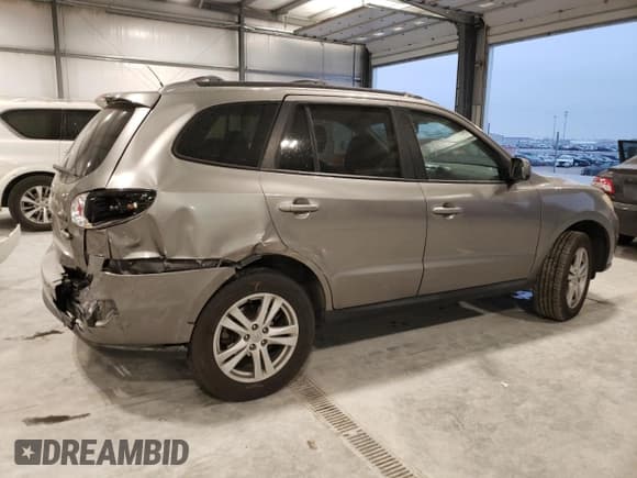 ✅ 2011 Hyundai Santa Fe SE • VIN: 5XYZHDAG4BG005119 • Lot: 85141464. Listed on Copart with 186,384 mi. Free auction sales archive from the USA and detailed vehicle history report at DreamBid. Image 3.