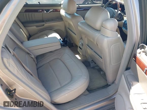 ✅ 2004 Cadillac DeVille DHS • VIN: 1G6KE54Y04U130501 • Lot: 42318769. Listed on IAAI with 81,512 mi. Free auction sales archive from the USA and detailed vehicle history report at DreamBid. Image 8.