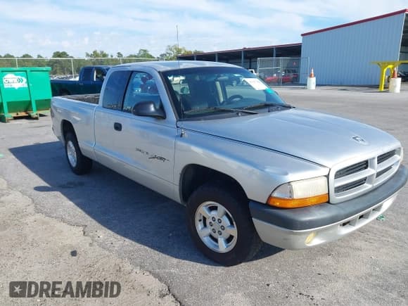 ✅ 2001 Dodge Dakota • VIN: 1B7GL22X21S121968 • Lot: 43317250. Listed on IAAI with 163,485 mi. Free auction sales archive from the USA and detailed vehicle history report at DreamBid. Image 1.
