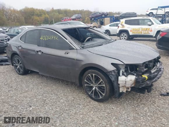 ✅ 2019 Toyota Camry LE • VIN: 4T1B11HK2KU205294 • Лот: 43652792. Опубликован ранее на IAAI с пробегом 99 493 миль. Бесплатный доступ к архиву аукционных продаж из США и подробный отчёт об истории автомобиля на DreamBid. Изображение 1.