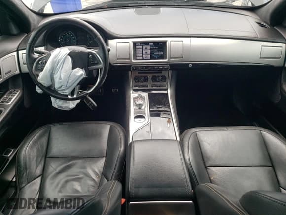 ✅ 2015 Jaguar XF Portfolio • VIN: SAJWJ0FF5F8U54243 • Лот: 68760435. Опубликован ранее на Copart с пробегом 77 552 миль. Бесплатный доступ к архиву аукционных продаж из США и подробный отчёт об истории автомобиля на DreamBid. Изображение 8.