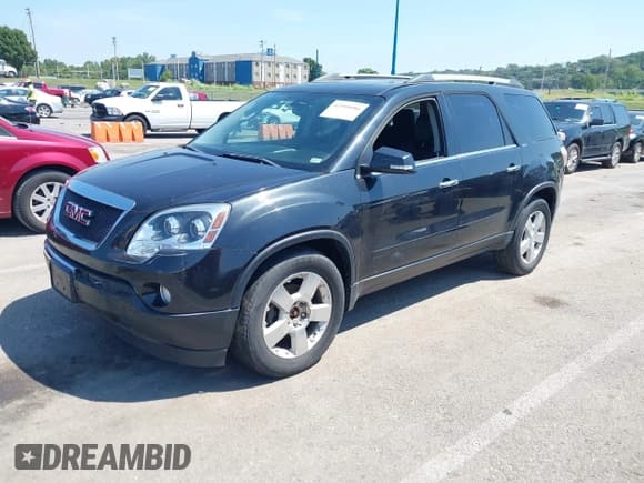 ✅ 2011 GMC Acadia SLT2 • VIN: 1GKKVSED6BJ385146 • Лот: 42958086. Опубликован ранее на IAAI с пробегом 168 873 миль. Бесплатный доступ к архиву аукционных продаж из США и подробный отчёт об истории автомобиля на DreamBid. Изображение 2.