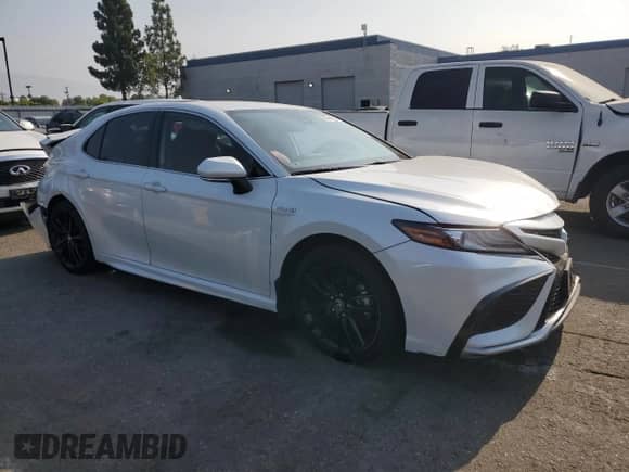 2021 Toyota Camry Hybrid XSE с VIN 4T1K31AKXMU548944, выставлен на аукционе Copart как лот 68894265 с пробегом 81 648 миль миль и Списание • Salvage title. История ставок и продаж доступна на DreamBid. Изображение 4.